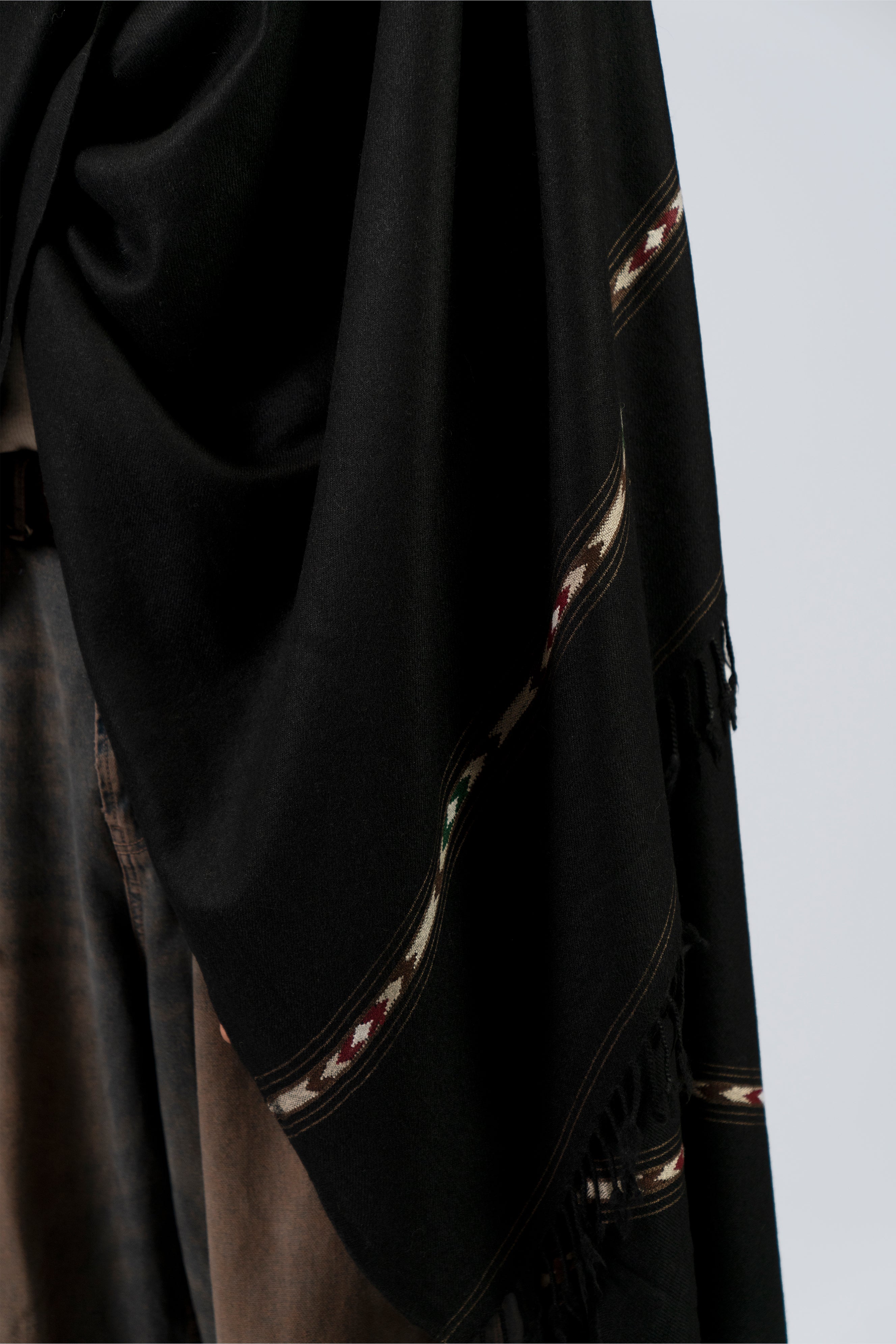 Black handwoven lamb wool blanket scarf detail shot