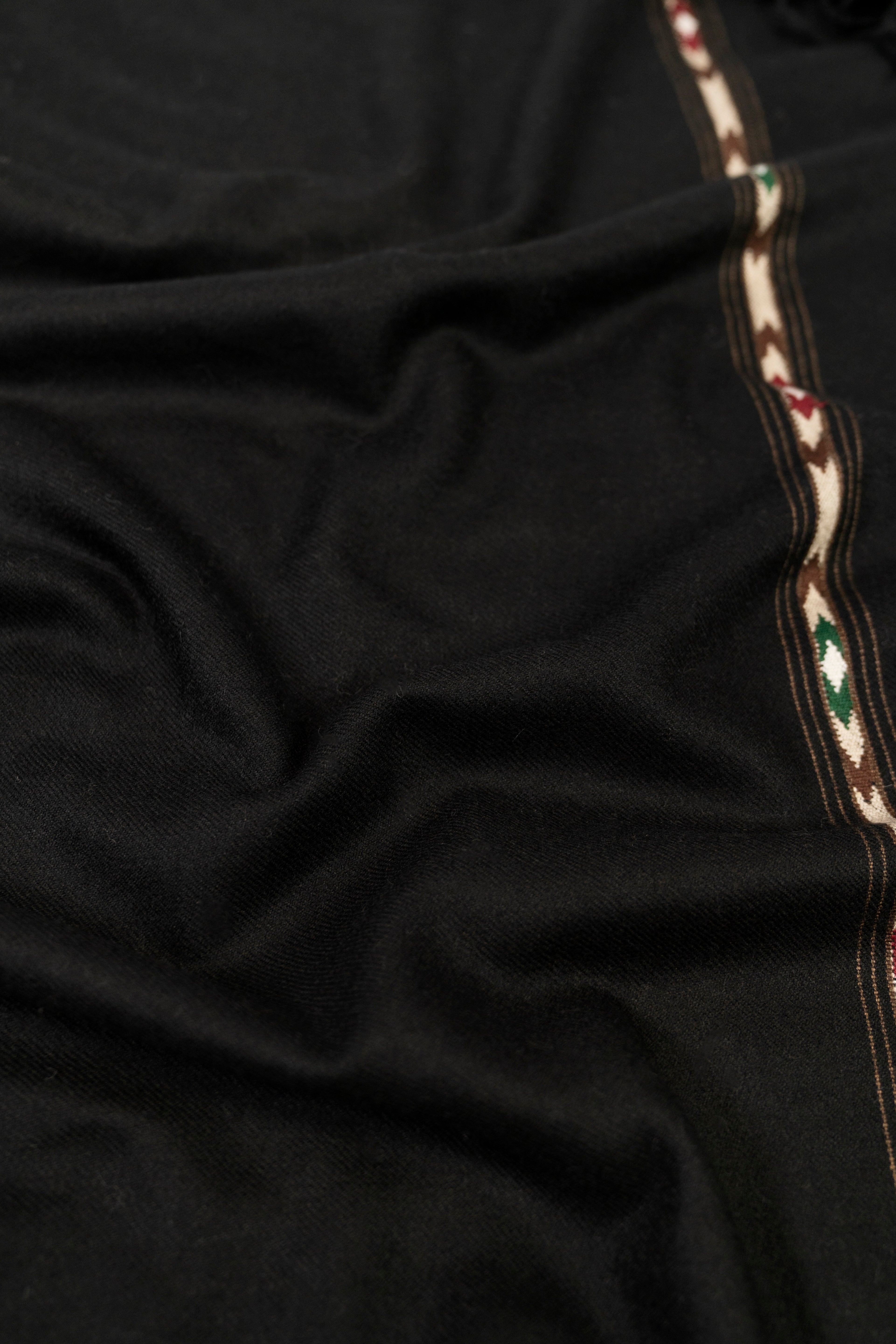 Black handwoven lamb wool blanket scarf detail shot