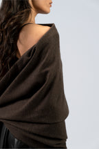Brown handwoven wool shawl close-up with draped back detail