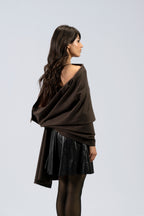 Brown handwoven wool shawl worn by model, back view