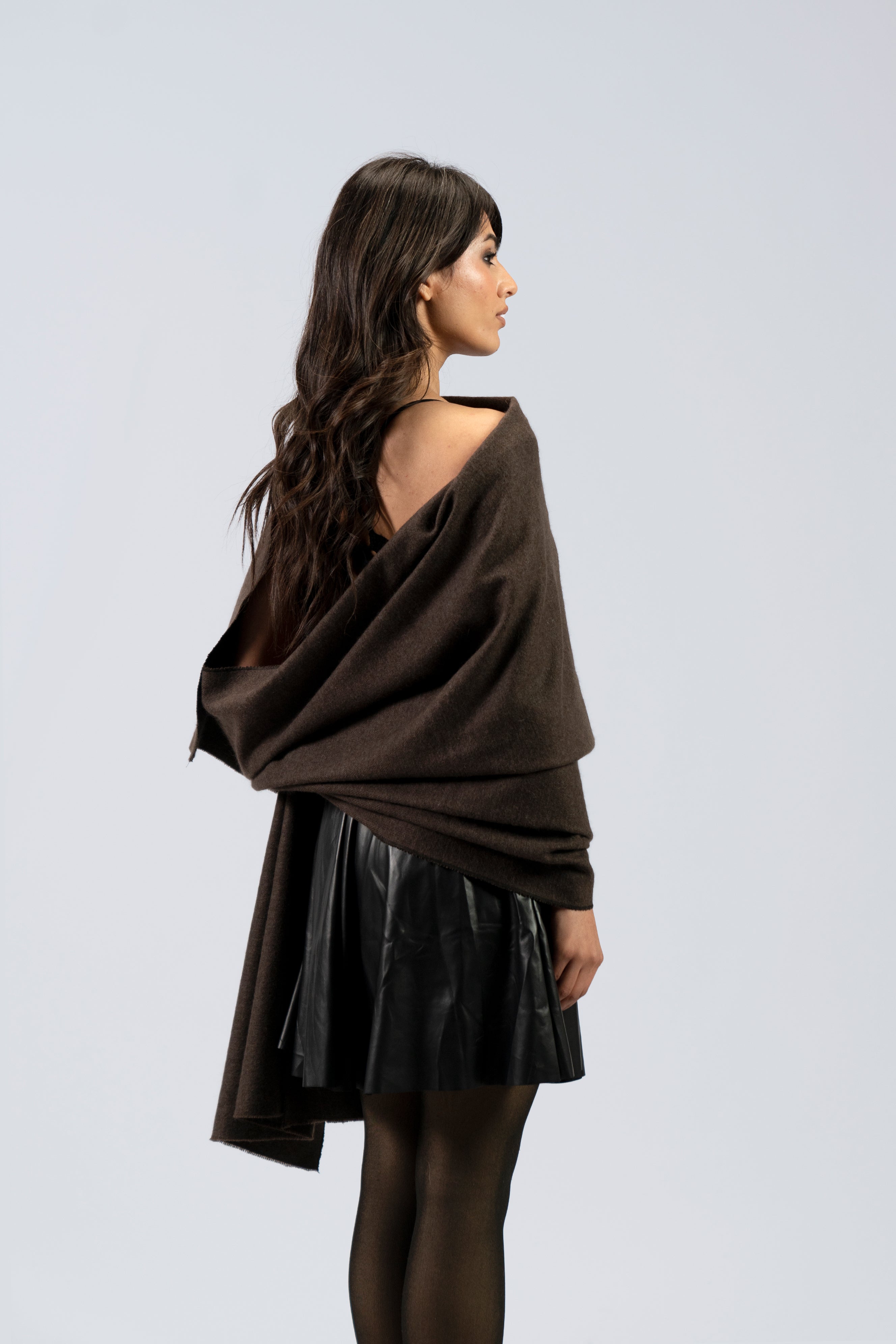 Brown handwoven wool shawl worn by model, back view