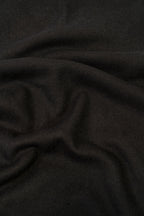 Black midweight wool shawl close-up of khadi weave fabric texture
