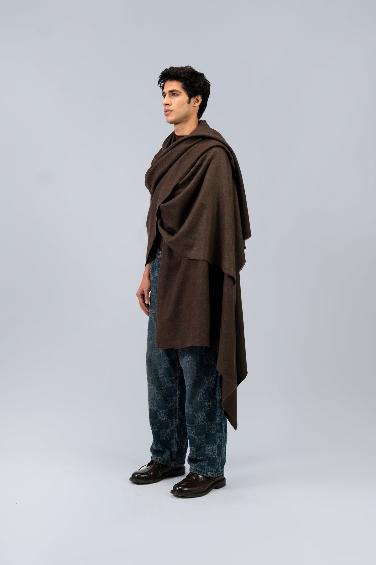 Brown handwoven midweight wool shawl, worn