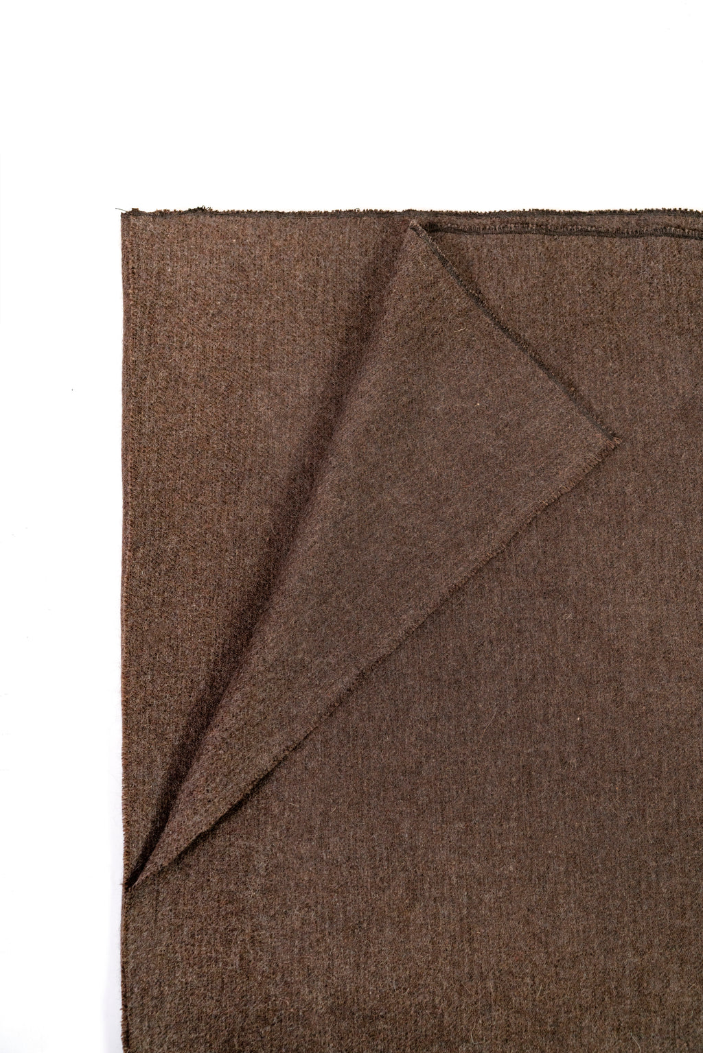 Brown handwoven wool shawl folded flat, fabric detail