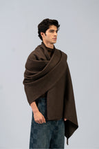 Brown wool shawl on model, side view