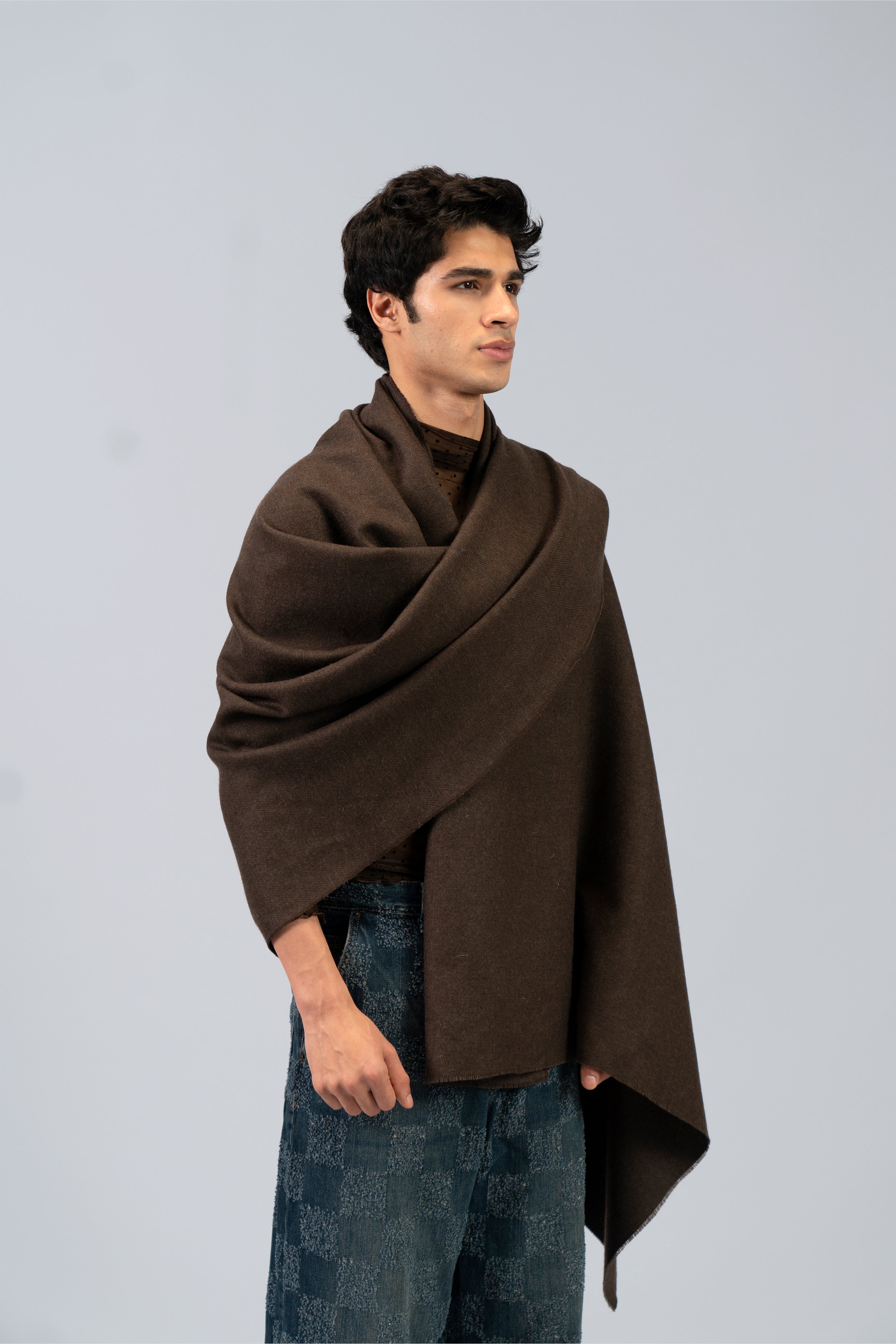 Brown wool shawl on model, side view