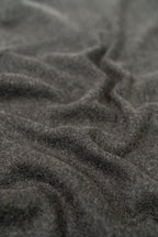 Gray handwoven wool shawl fabric texture detail