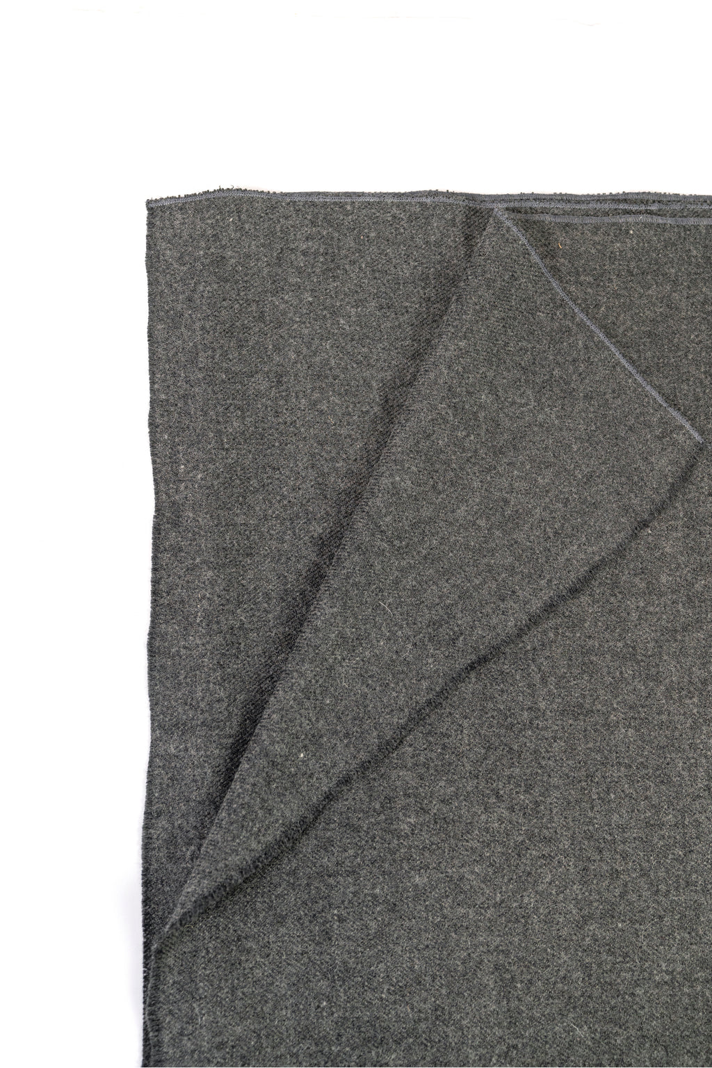 Gray handwoven wool shawl folded flat, fabric detail