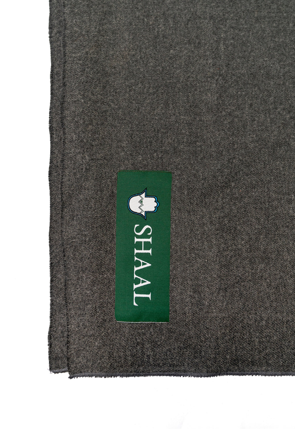 Gray handwoven wool shawl with SHAAL label detail