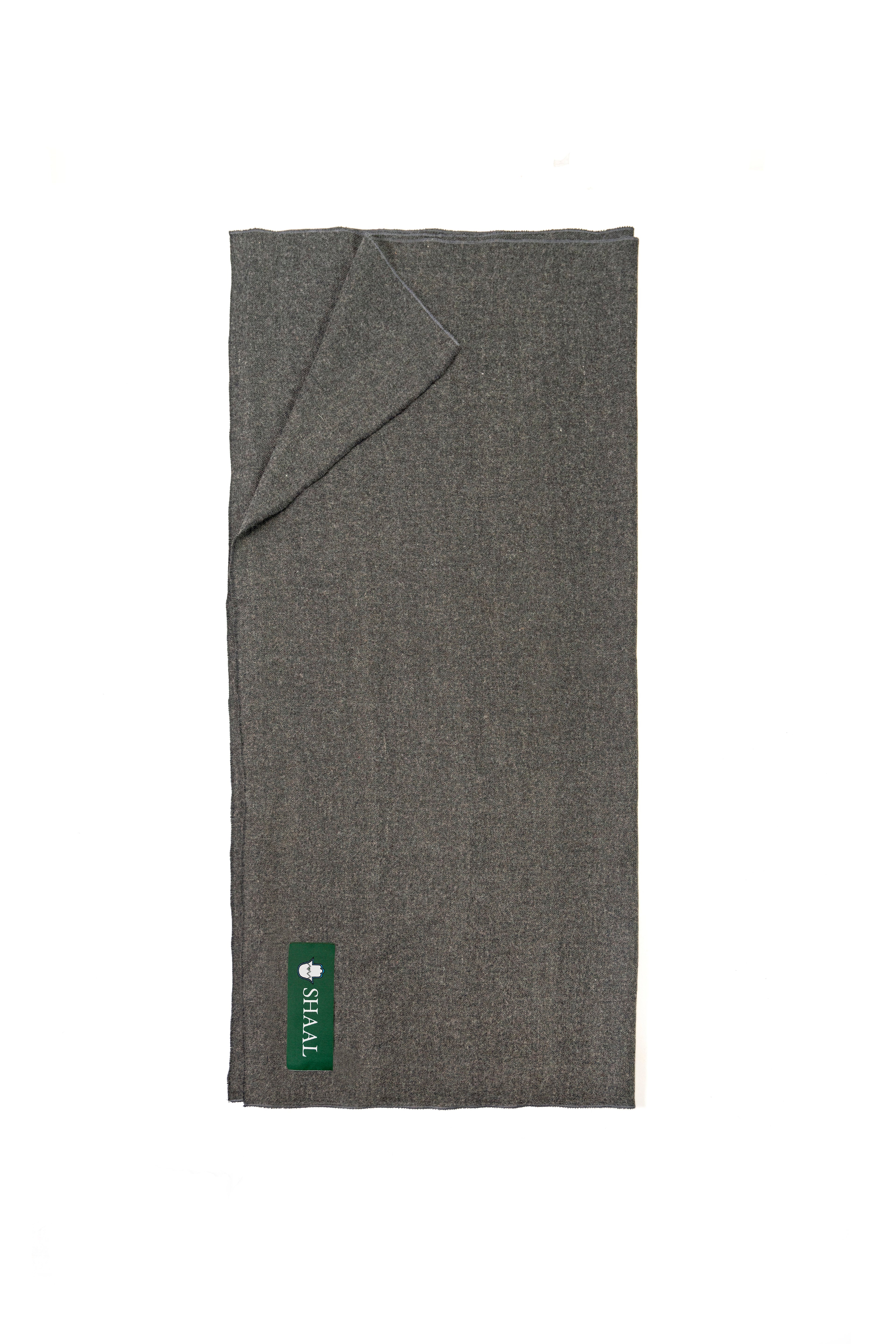 Gray handwoven wool shawl folded flat with SHAAL label