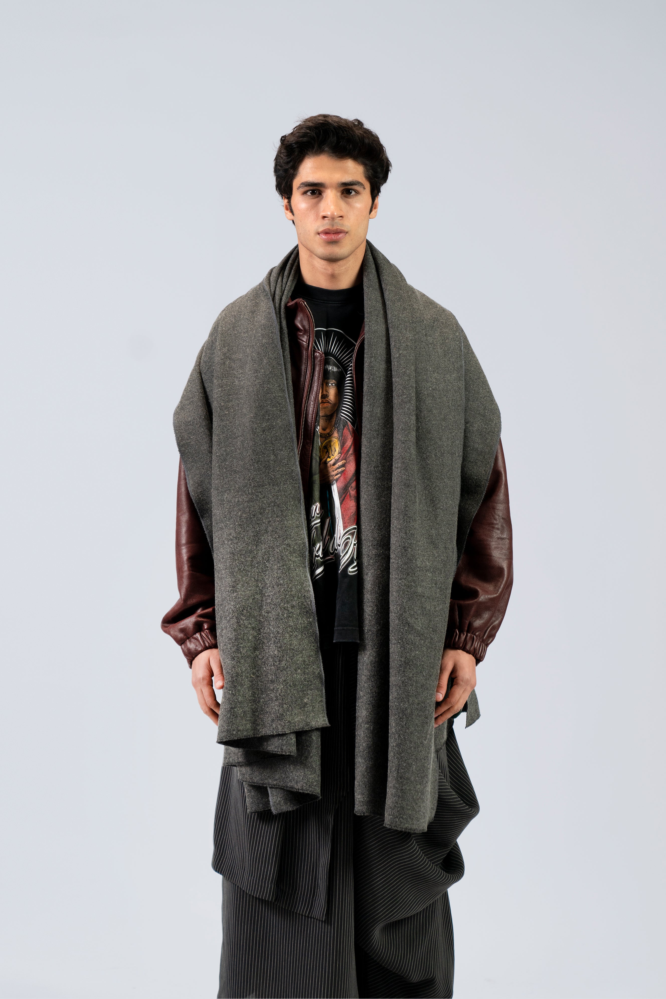 gray wool shawl worn by a man, handwoven by SHAAL