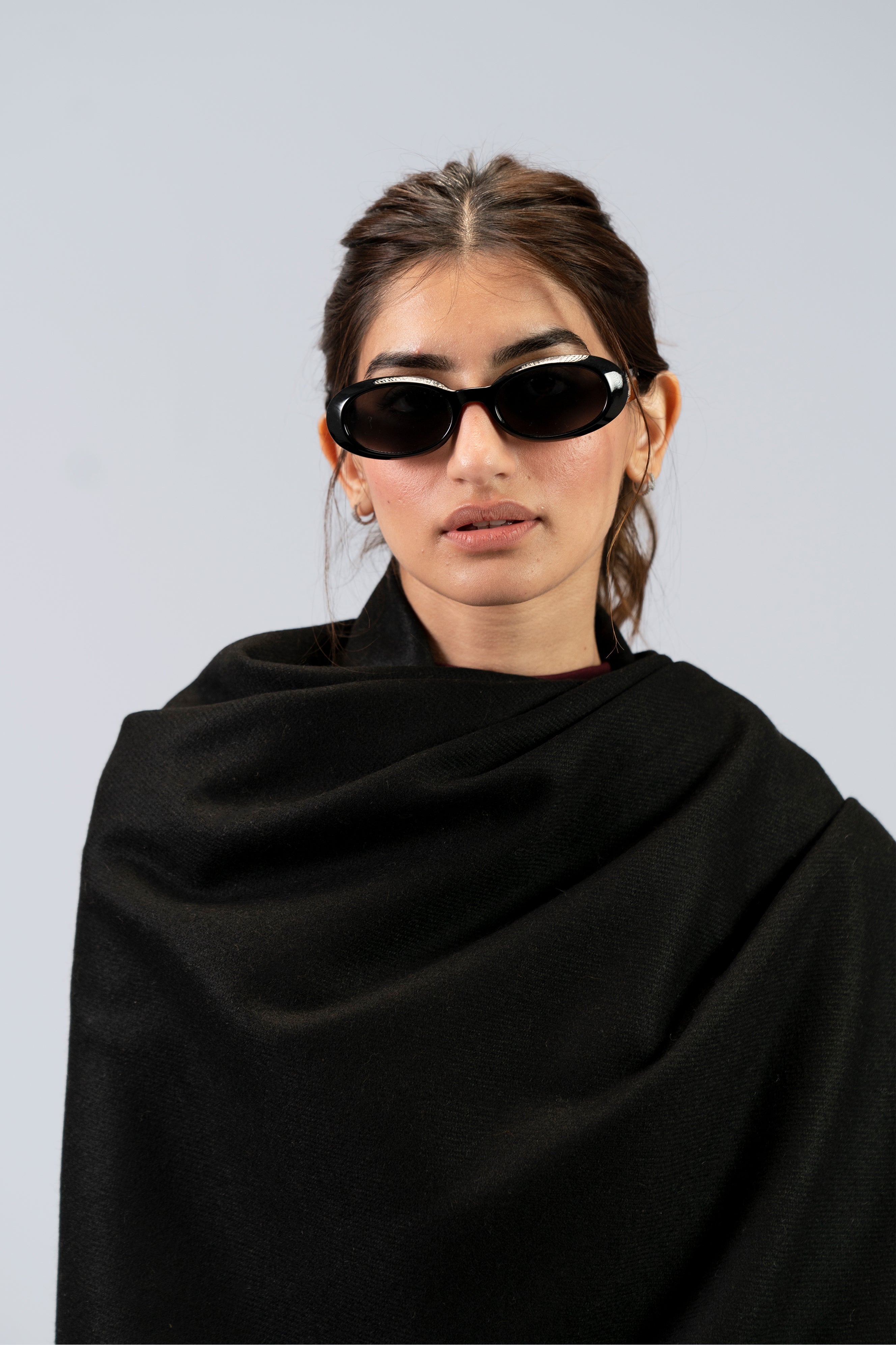 black handwoven wool shawl worn by a man, handwoven by SHAAL