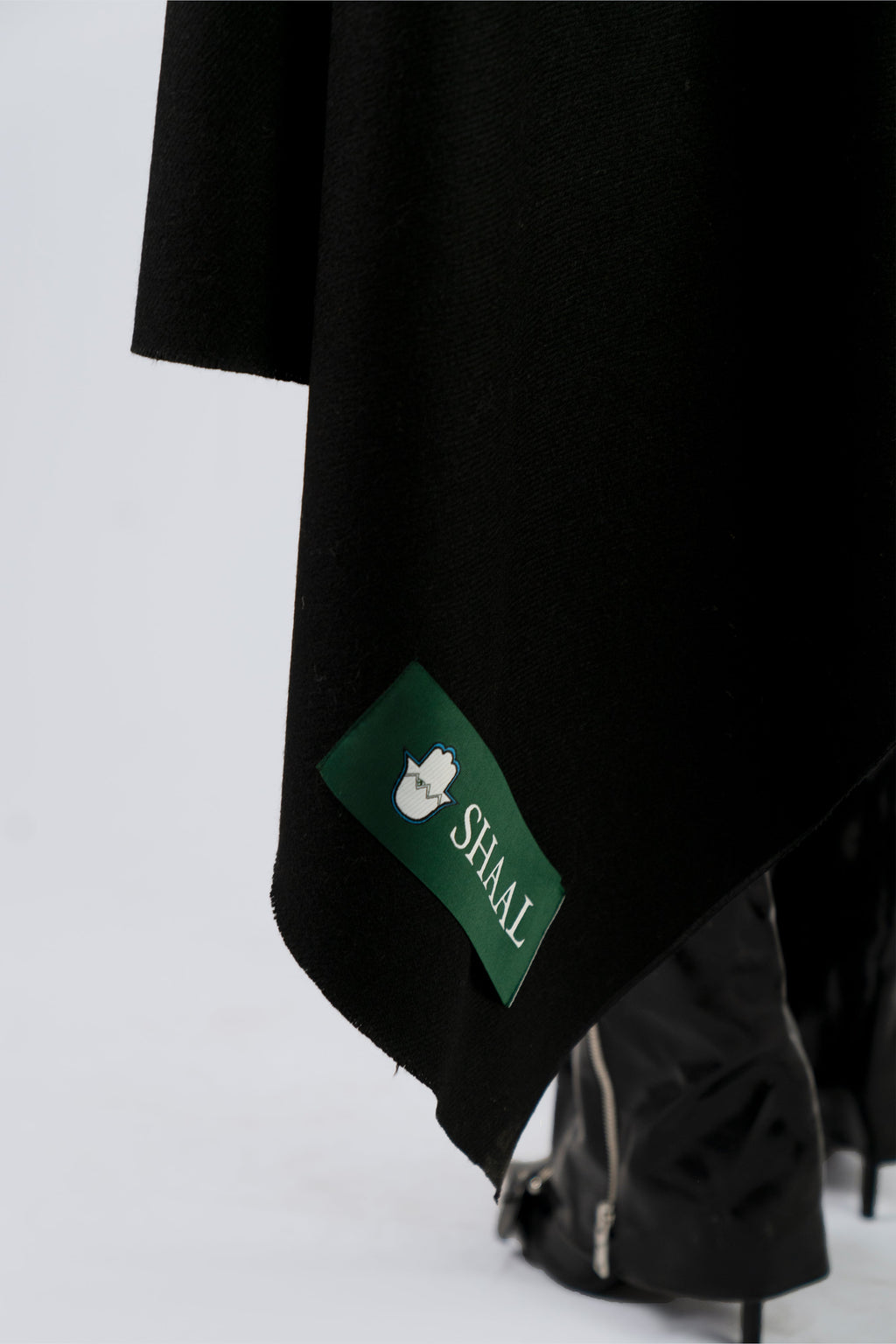 black handwoven wool shawl worn by a man, handwoven by SHAAL