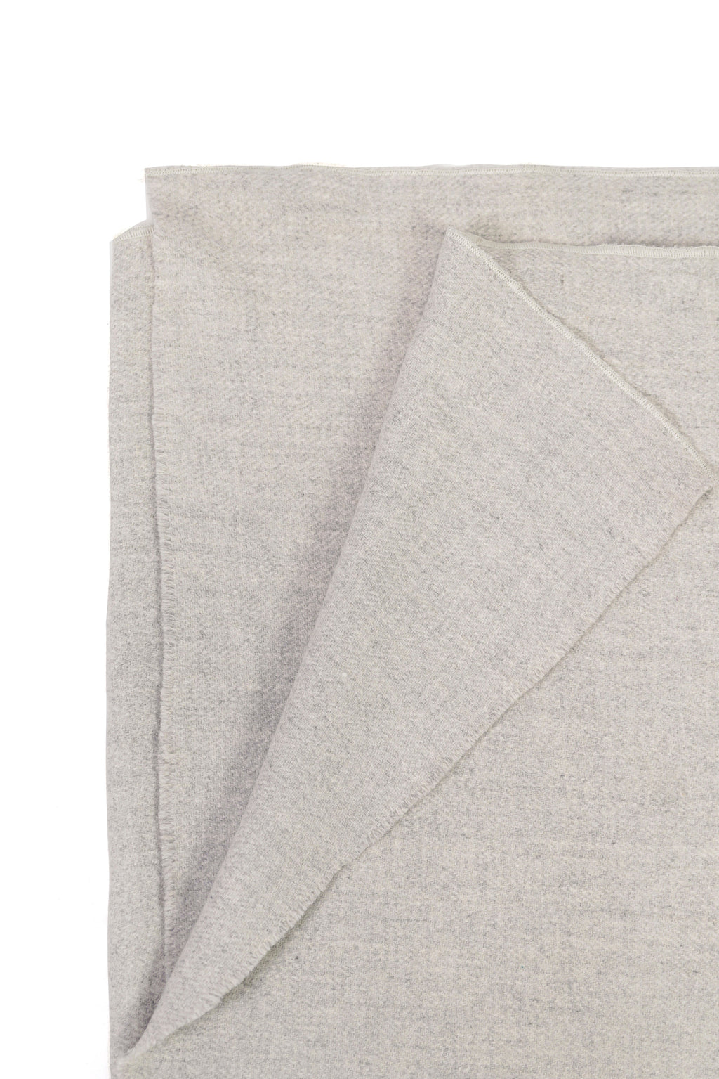 silver handwoven wool shawl worn by a woman, handwoven by SHAAL