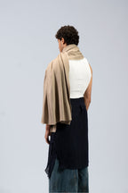 beige handwoven wool shawl worn by a woman, handwoven by SHAAL