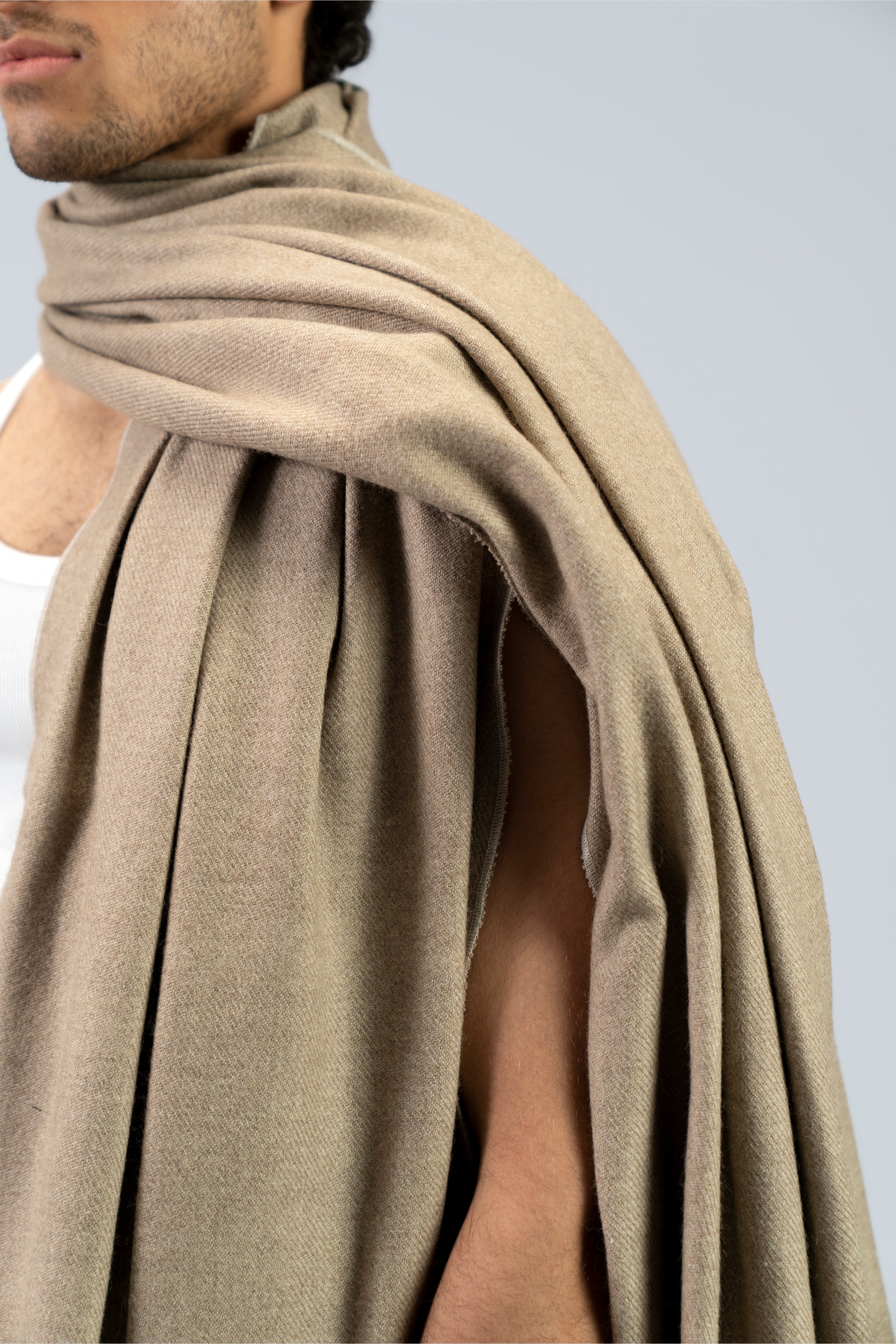 beige handwoven wool shawl worn by a woman, handwoven by SHAAL