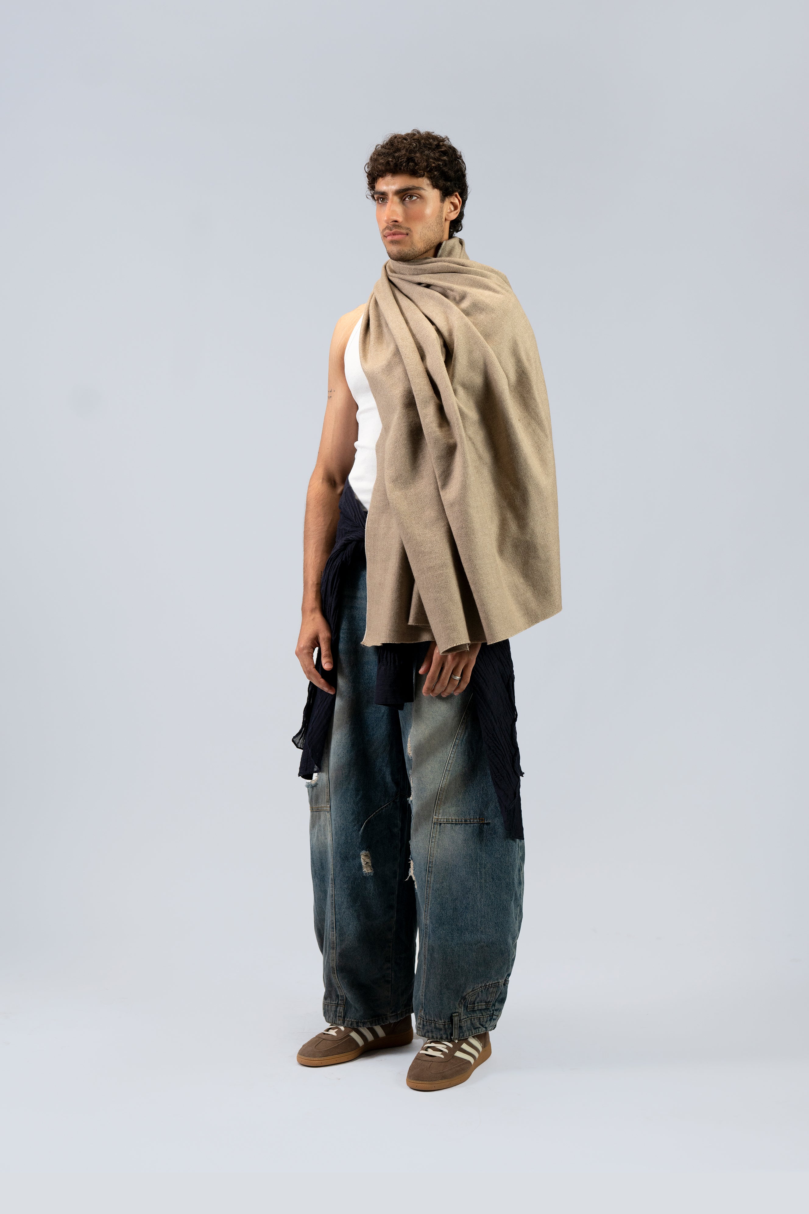beige handwoven wool shawl worn by a woman, handwoven by SHAAL