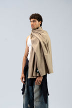 Beige handwoven heavyweight wool shawl, worn