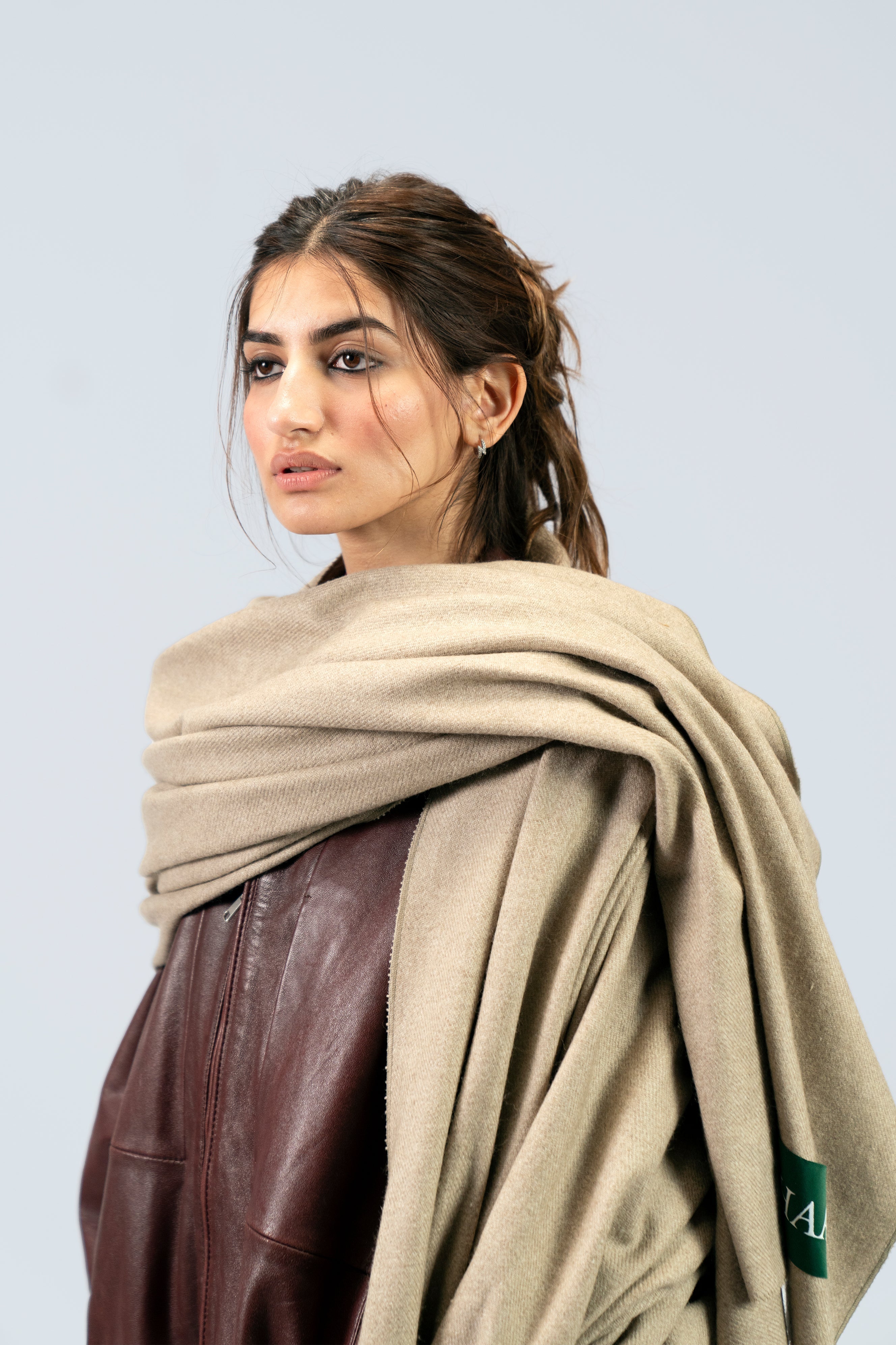 beige handwoven wool shawl worn by a man, handwoven by SHAAL