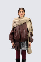 beige handwoven wool shawl worn by a man, handwoven by SHAAL