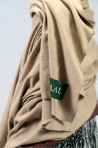 beige handwoven wool shawl worn by a man, handwoven by SHAAL