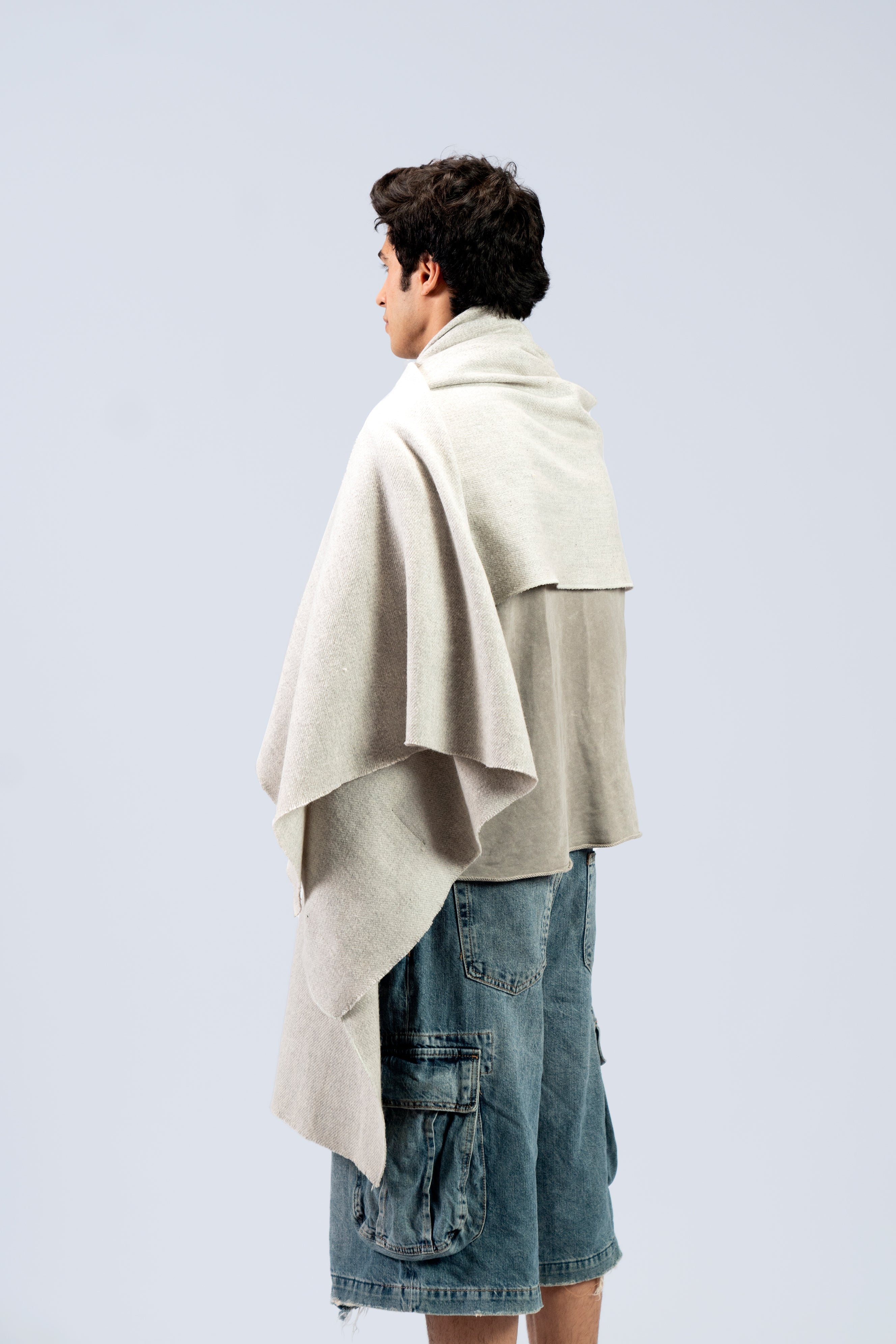 silver handwoven wool shawl worn by a man, handwoven by SHAAL