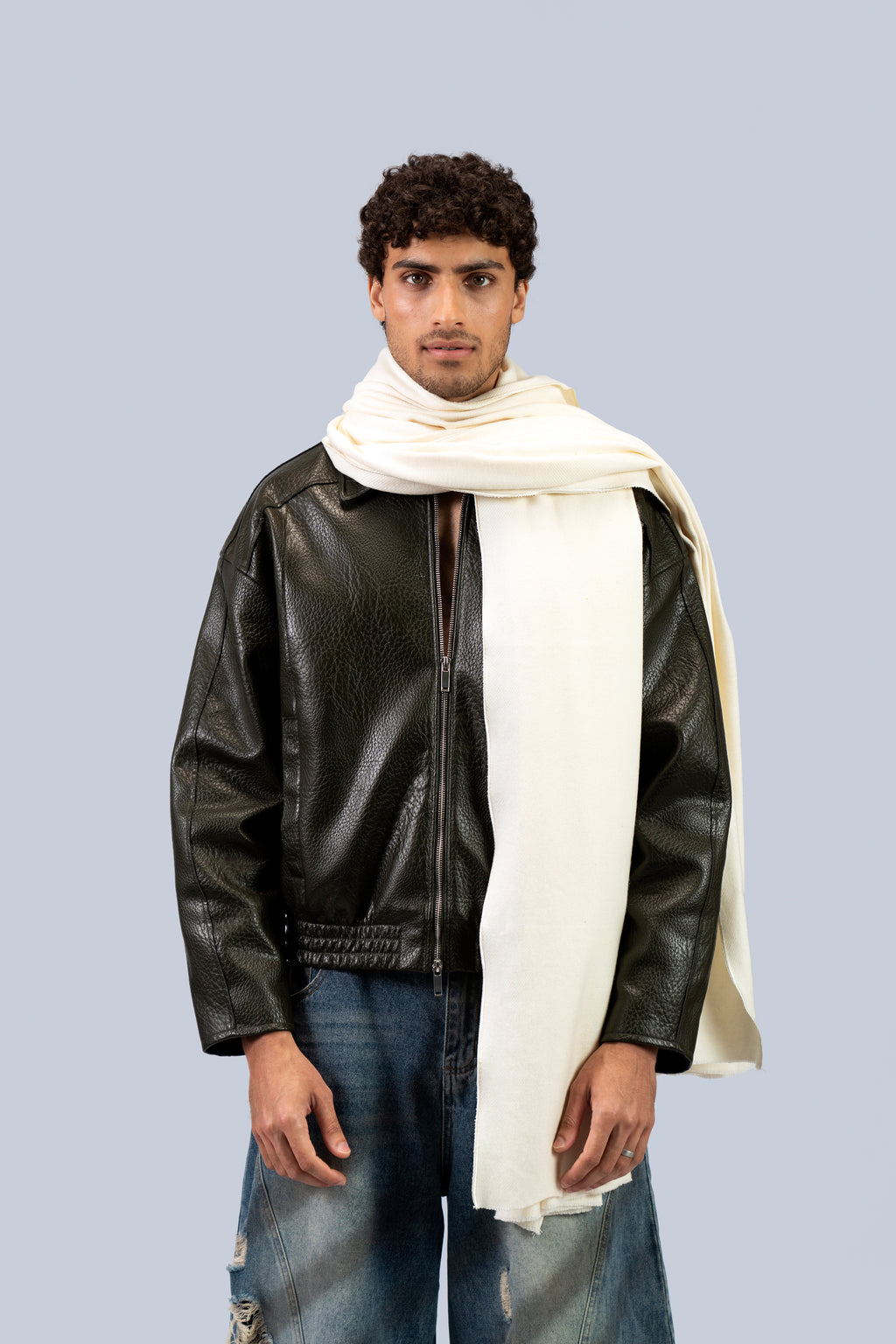 Off White heavyweight lamb wool shawl wrapped over leather jacket on male model, front view
