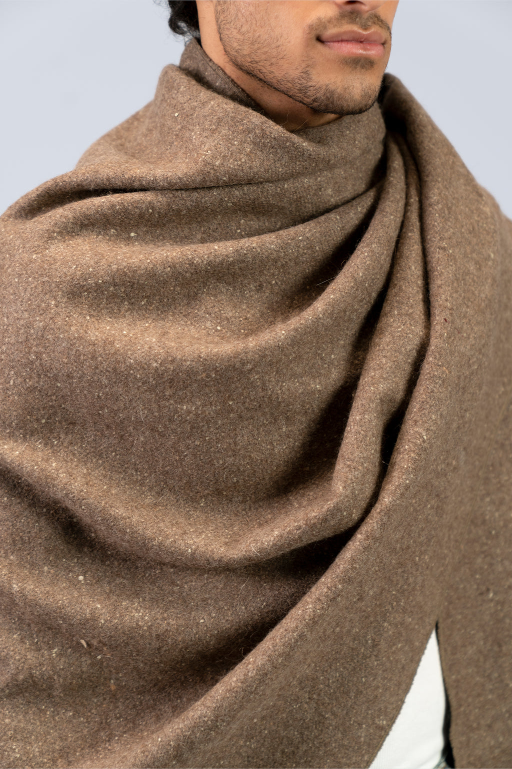 Brown yak wool shawl folded detail, showing fabric weight