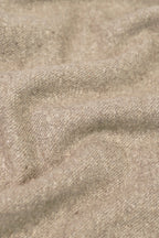 Beige yak wool shawl close-up showing handwoven fabric texture