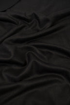 Black pashmina shawl close-up of soft cashmere-blend fabric weave
