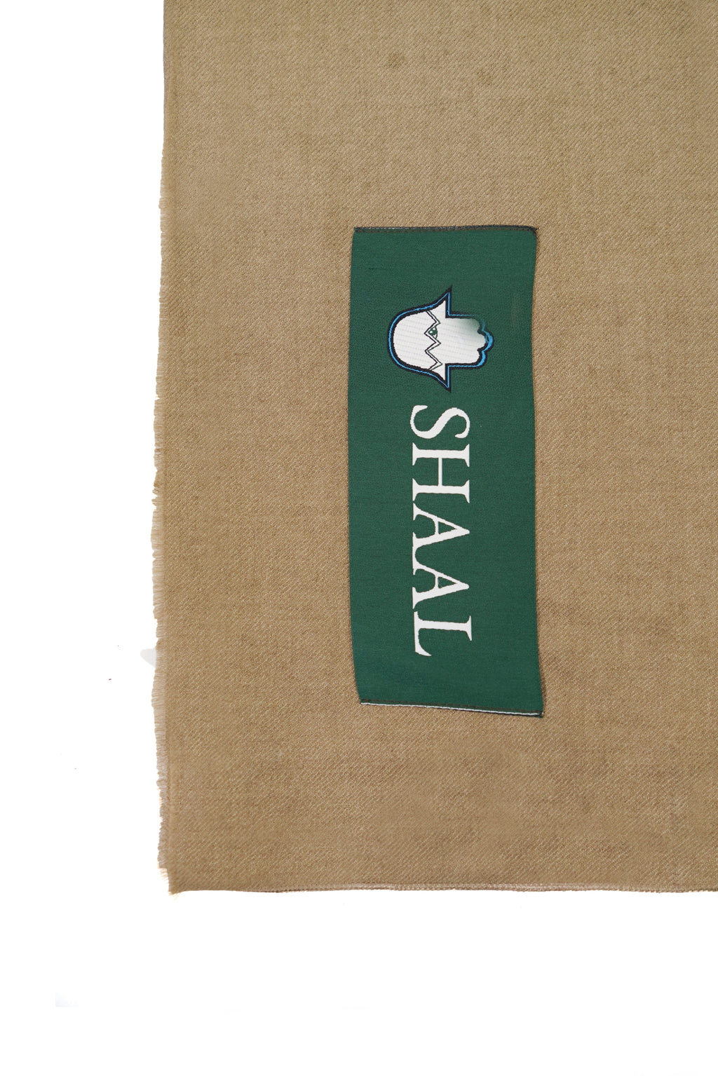 Gold pashmina shawl detail of green SHAAL woven label