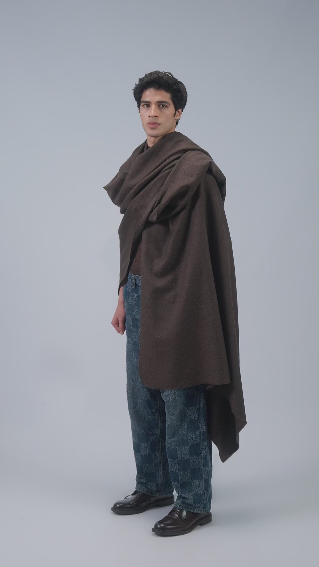 Brown handwoven wool shawl worn by model, full-length video