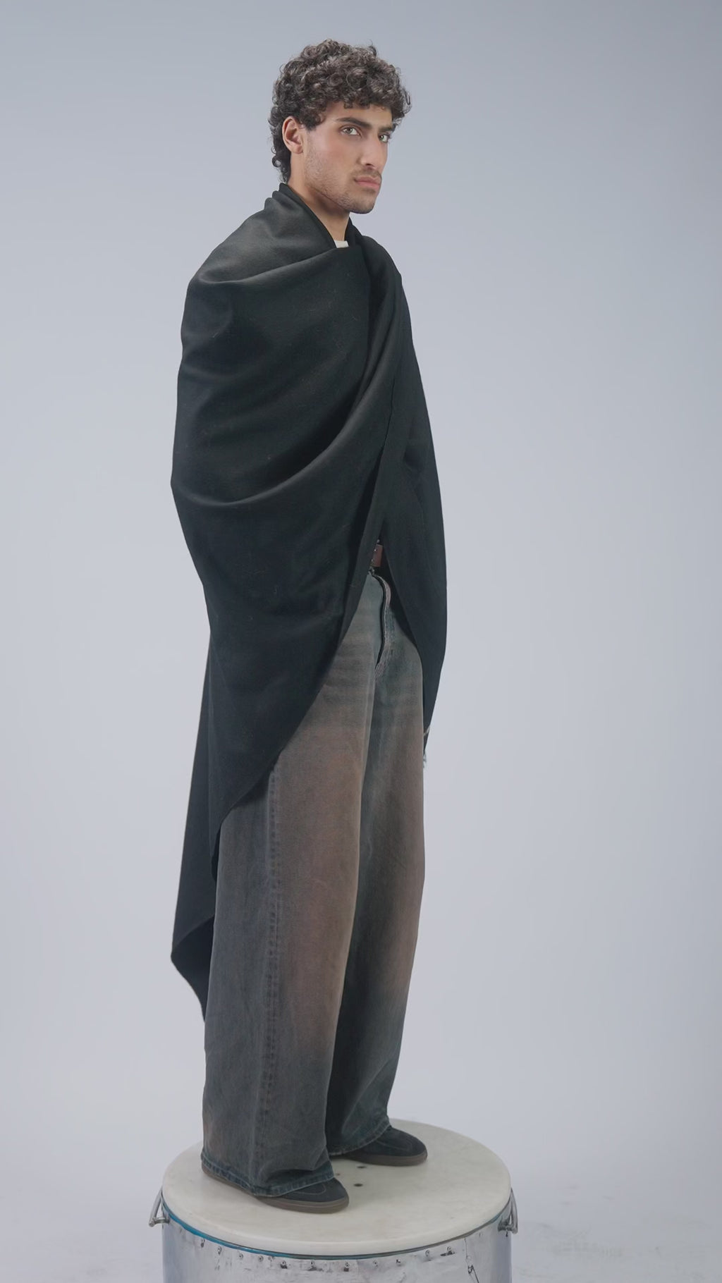 Black wool blanket scarf styling demonstration video