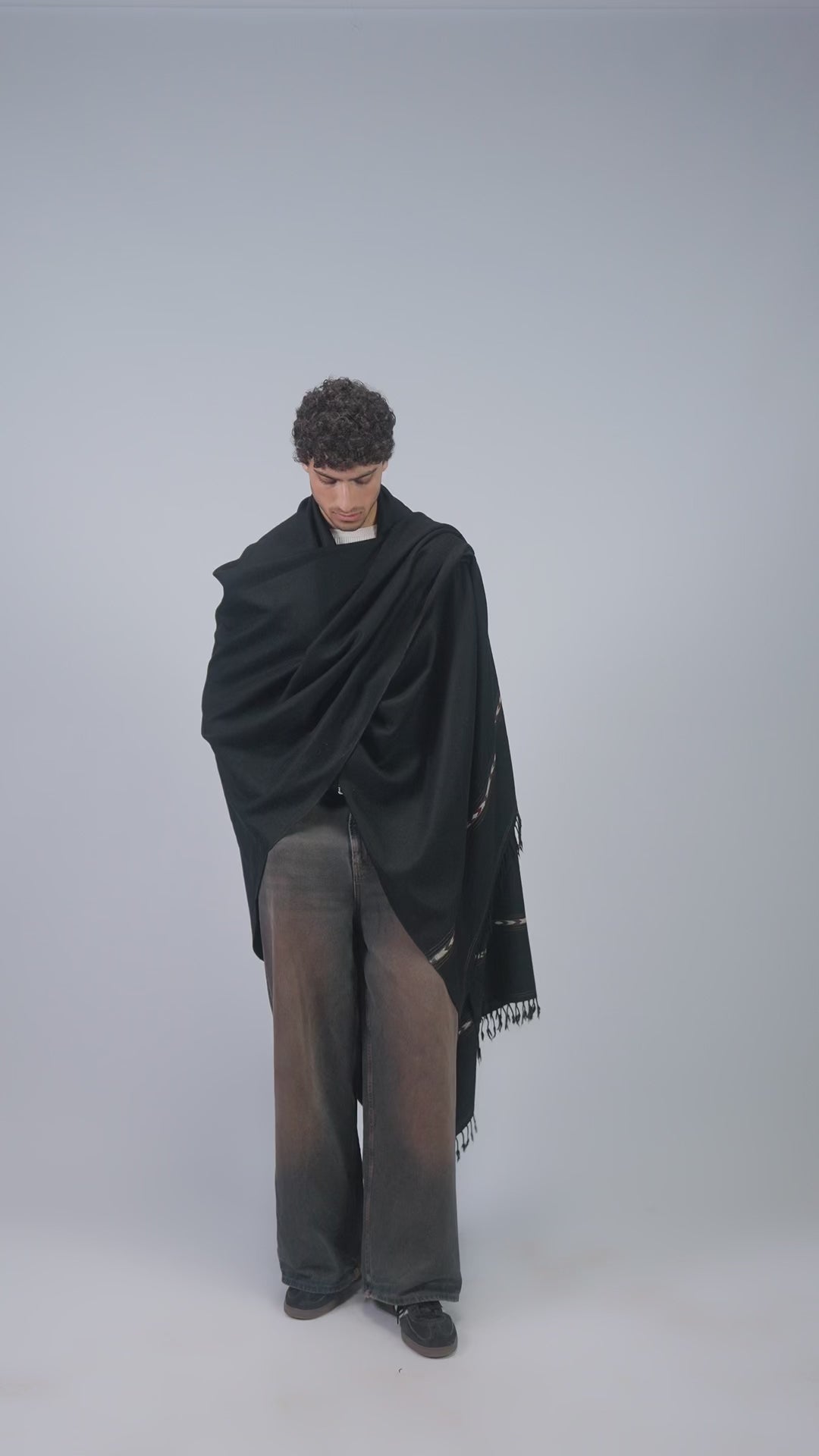 Black wool blanket scarf styling demonstration video