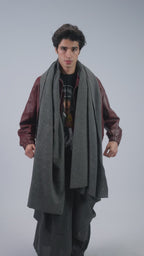 Gray handwoven wool shawl worn by model, full-length video