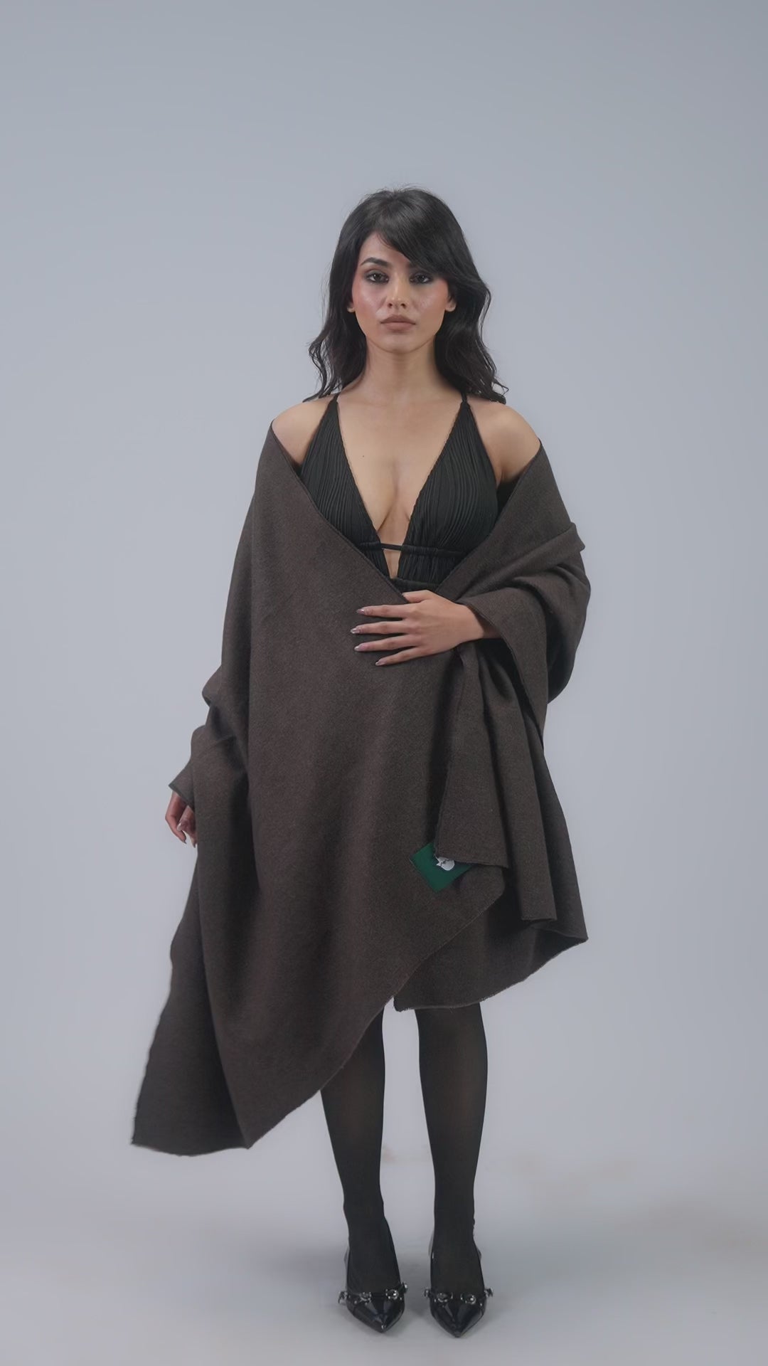 Brown handwoven wool shawl worn by model, full-length video
